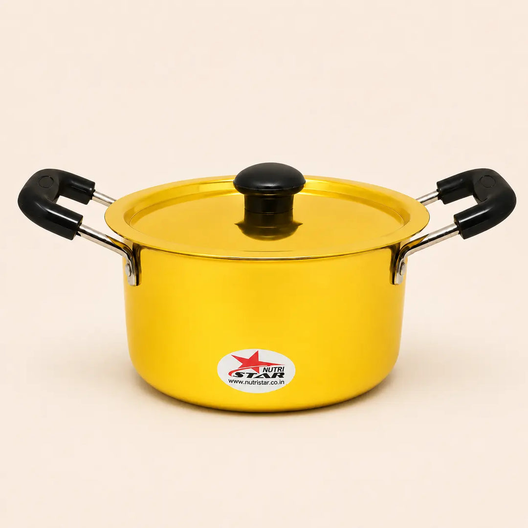 Nutristar Brass casserole pot with lid, black stay-cool handles and matching knob on off-white backgroun