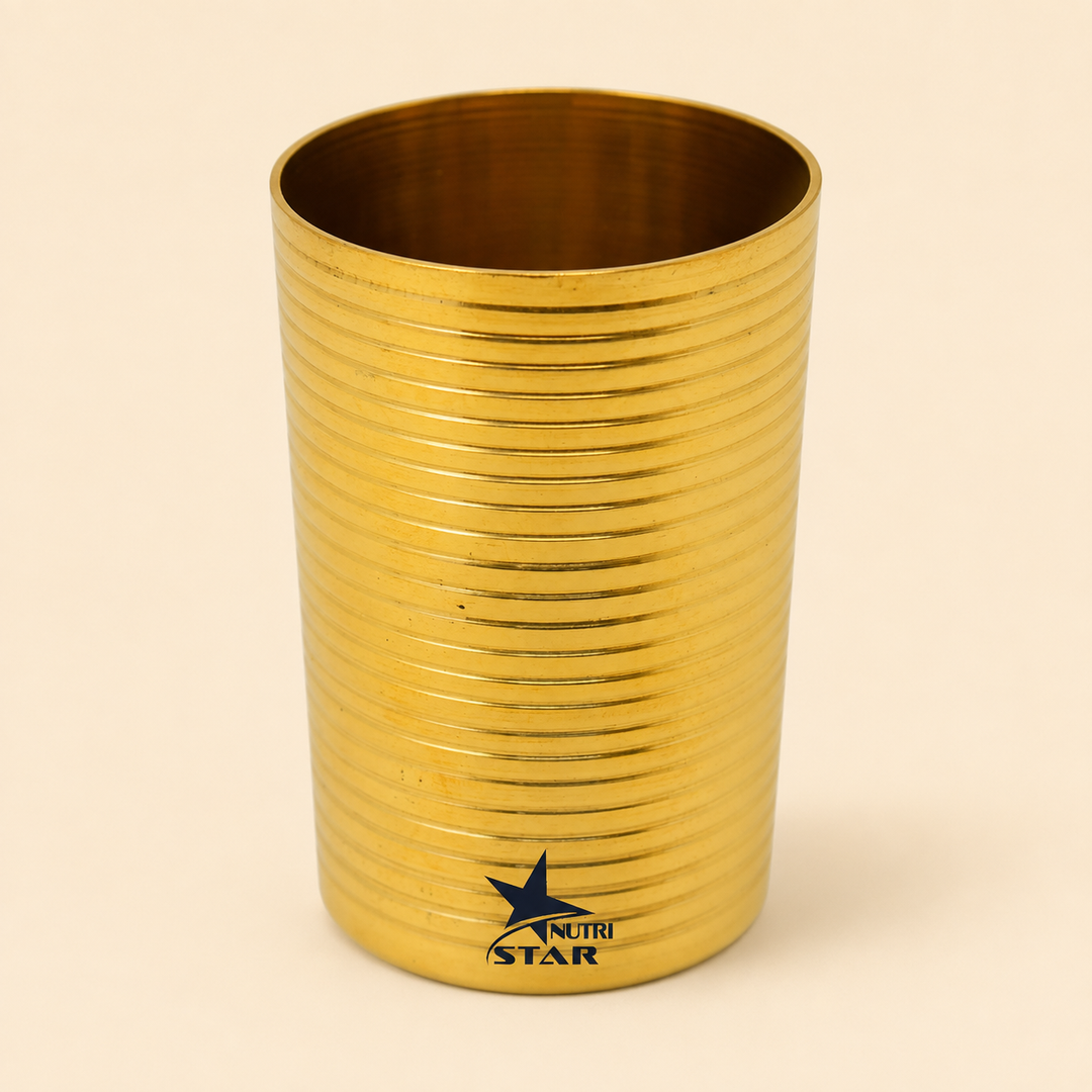 Nutristar brass drinking glass with golden finish and horizontal ribbed design