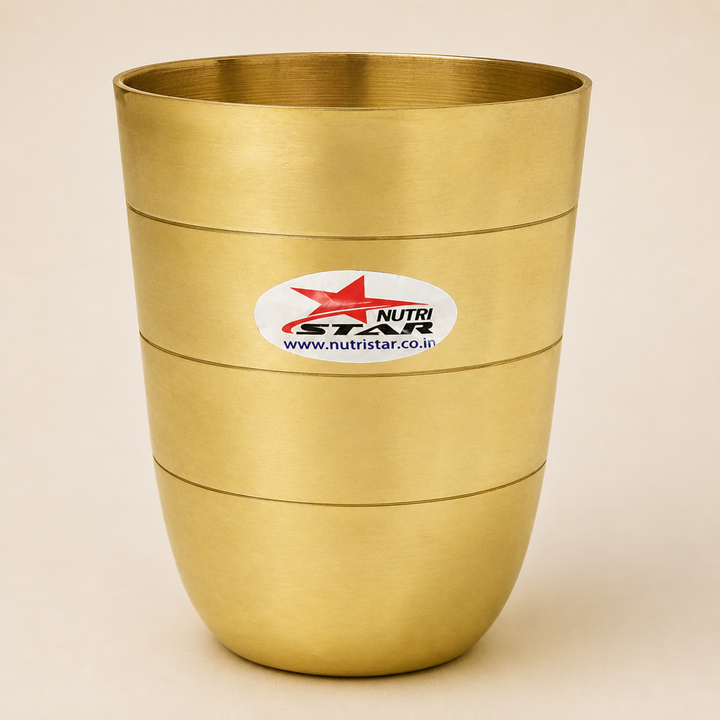 Nutristar brass drinking glass with polished golden finish and horizontal ring design