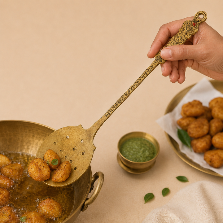 Nutristar brass perforated serving spoon with broad draining head and decorative engraved long handle