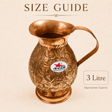 Embossed copper serving jug with floral design and comfortable handle
