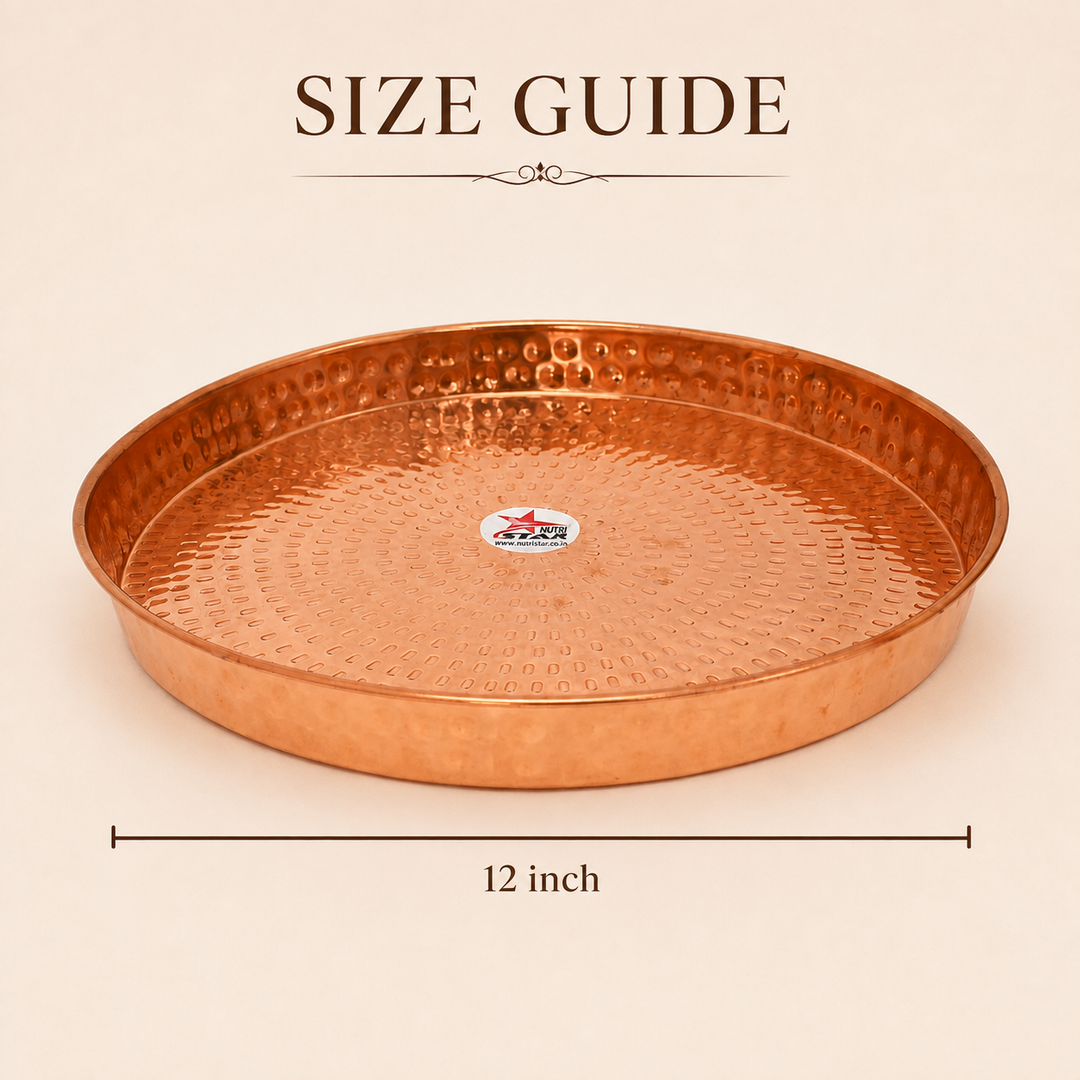 Copper serving plate with hammered texture raised rim and durable construction