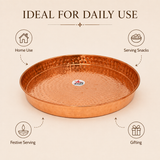 Copper serving plate with hammered texture raised rim and durable construction