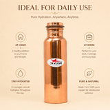 Pure copper water bottle with secure lid and durable construction