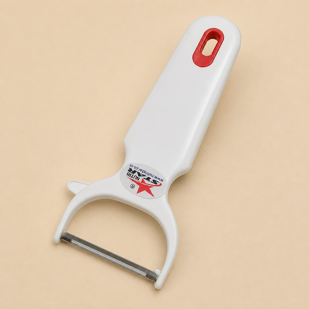 Nutristar white Y-shaped vegetable peeler with stainless steel blade and red hanging loop