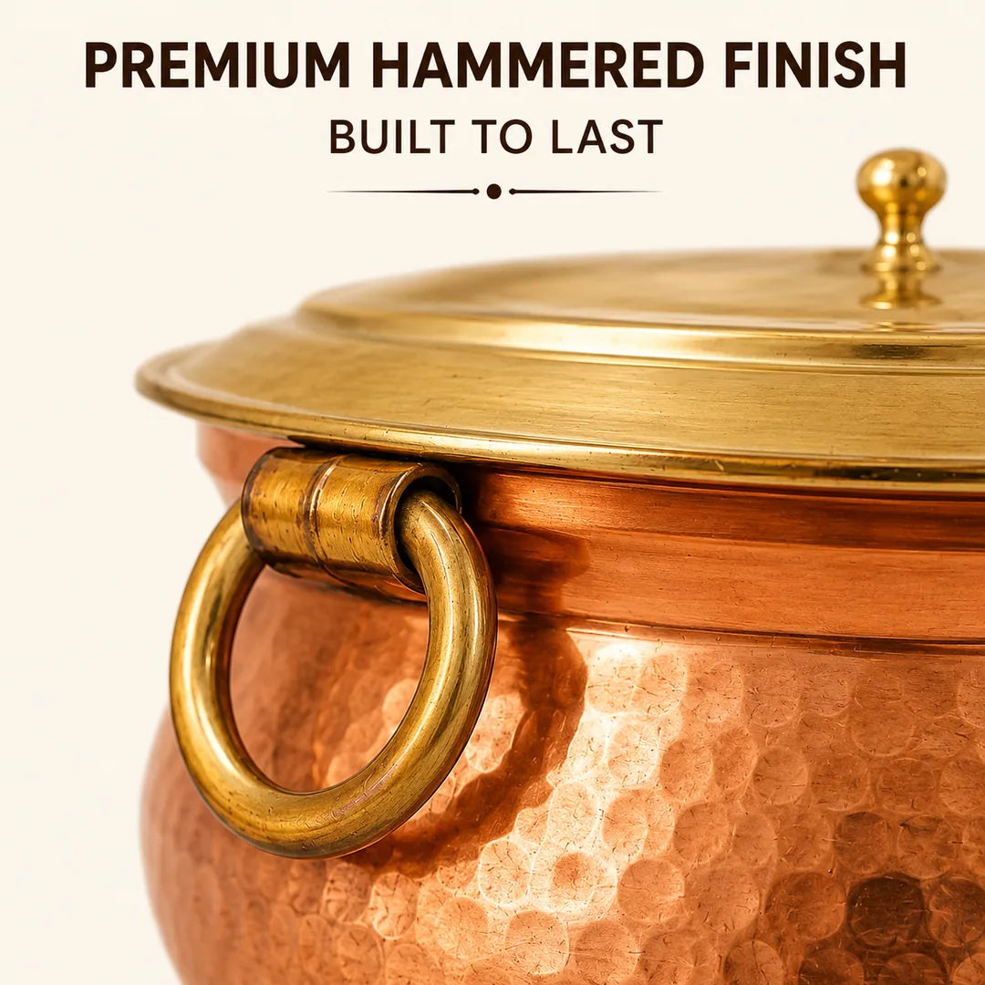 Close-up of Nutristar hammered copper biryani handi showing brass ring handle, hammered copper finish and brass lid