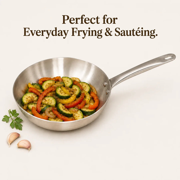 Nutristar stainless steel triply frypan with sautéed vegetables for everyday frying and cooking