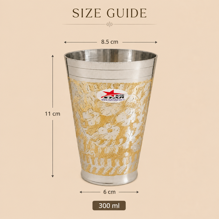 Nutristar decorative silver-tone drinking glass with gold floral engraving and tall tapered design