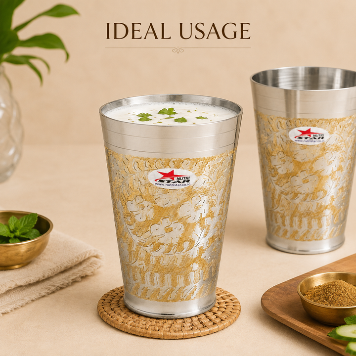 Nutristar decorative silver-tone drinking glass with gold floral engraving and tall tapered design